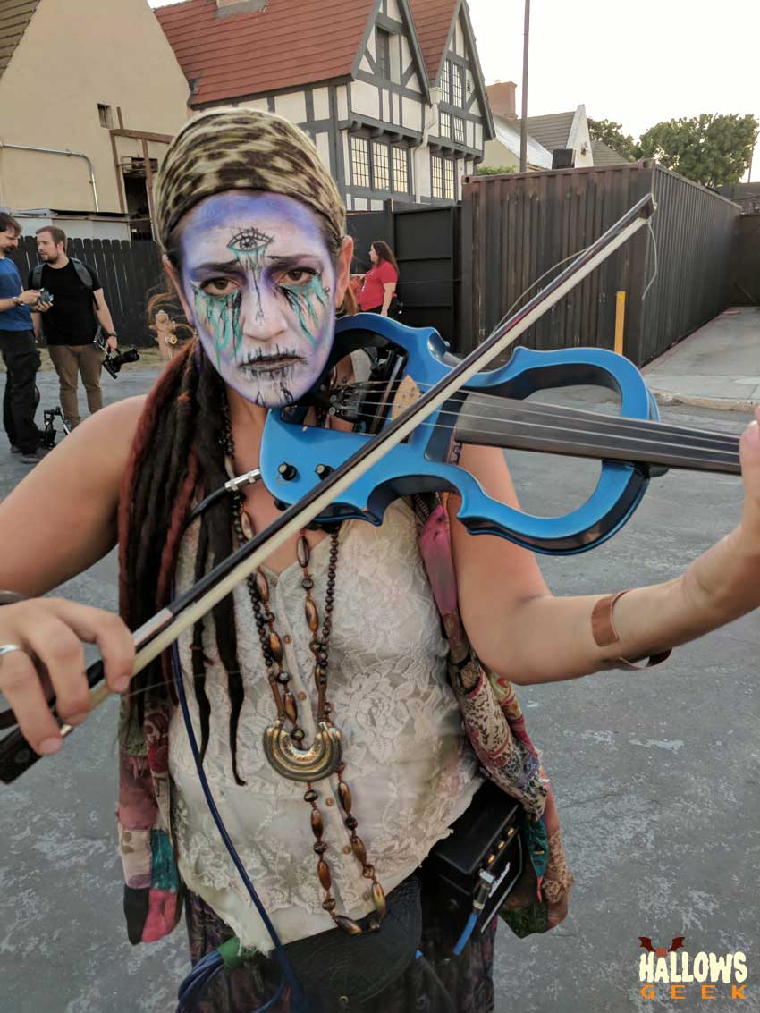 A monster playing the violin at The Queen Mary's Dark Harbor