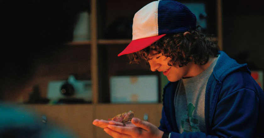 Dustin holding Dart in Stranger Things