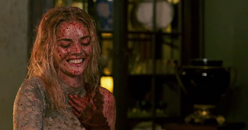 Samara Weaver covered in blood in the trailer for 'Ready Or Not'