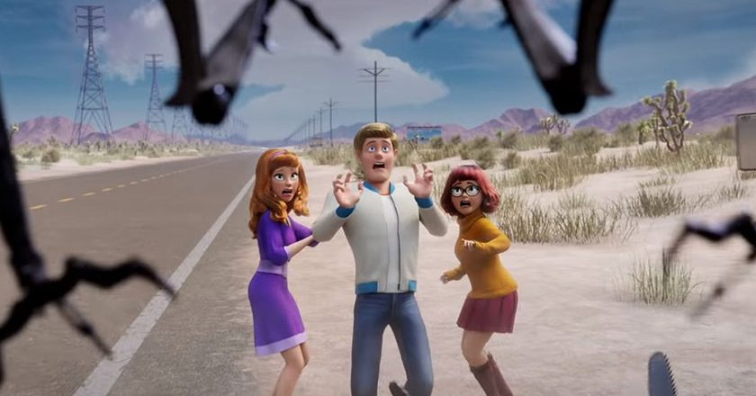 Daphne, Fred, and Velma being chased by a space robot