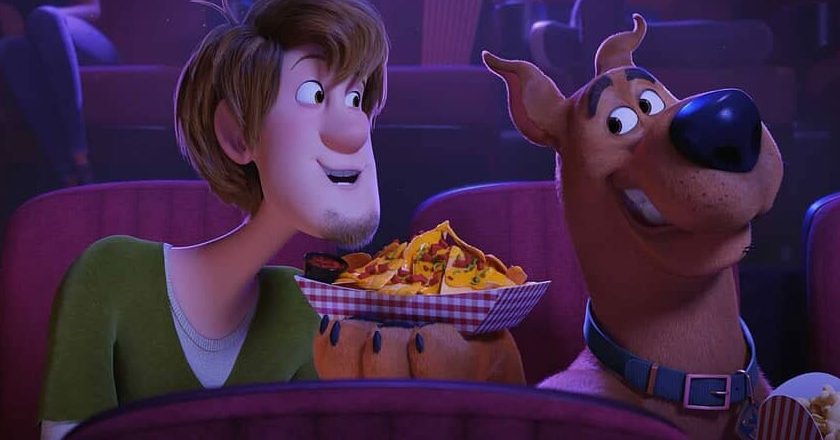 Scooby and Shaggy sharing nachos in a movie theater