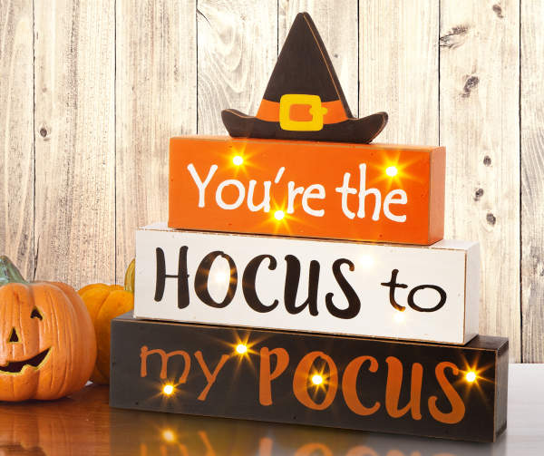Orange, white, and black blocks stacked that read "You're the Hocus to my Pocus"