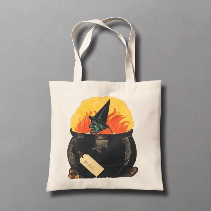 Canvas tote bag pops with 19th century-inspired image of a witch in a cauldron for a vintage feel