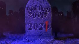 Tombstone that reads Living Dead Dolls 2020 with the last zero with a 1 written in blood over it.