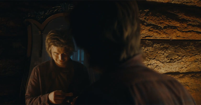 Joe Keery looking into a mirror in Taco Bell's "The Craving"