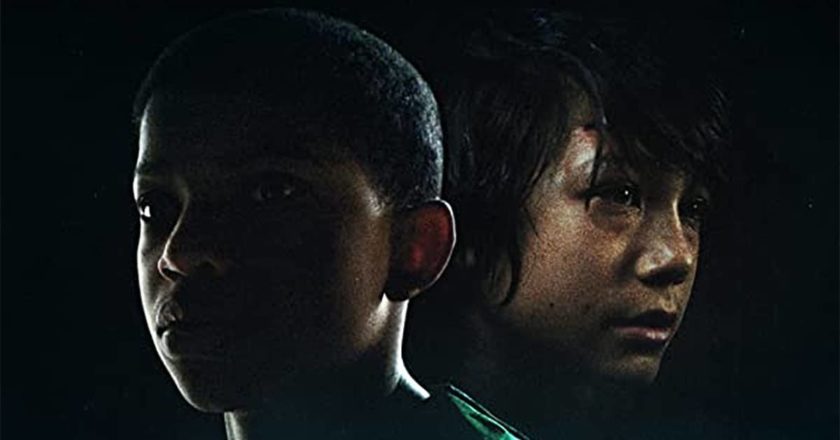 Lonnie Chavis and Ezra Dewey from "The Boy Behind the Door" poster