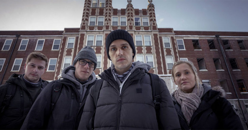 Alex Schroeder, Tanner Wiseman, Dakota Laden, and Chelsea Laden in front of the Waverly Hills Sanatorium