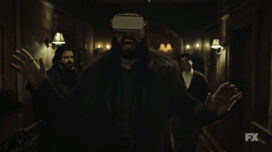 Nandor using a VR headset in the teaser for "What We Do in the Shadows" season three