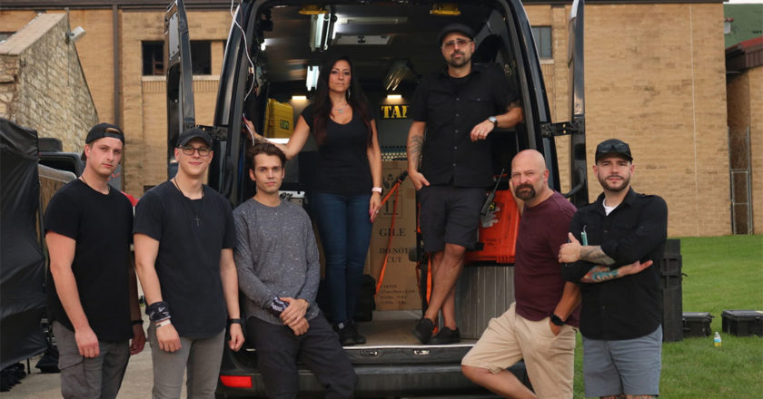 Destination Fear’s Alex Shroeder, Tanner Wiseman and Dakota Laden with the TAPS team Shari DeBenedetti, Dave Tango, Jason Hawes and Steve Gonsalves behind an equipment van at their investigation of the Old Joliet Prison.