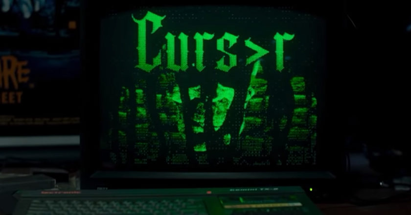 Computer screen with the "Curs>r" video game title screen on it