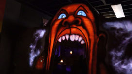 Candyman graffiti facade at The Mystic Museum's 90s Slashers exhibit