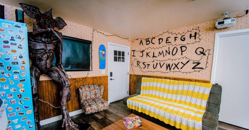 The Byers' living room recreated in the Demos Den cabin from Stranger Stays