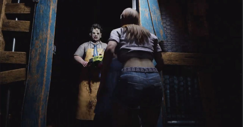 A victim stands in front of killer Leatherface in a doorway in "The Texas Chain Saw Massacre" video game