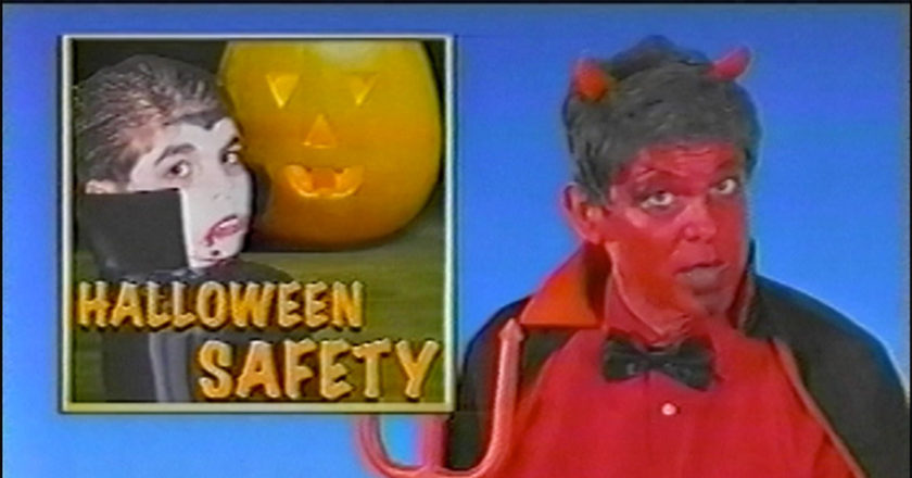 Still from the WNUF Halloween Sequel featuring a newscaster dressed as the devil
