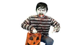 Crouching child zombie animatronic