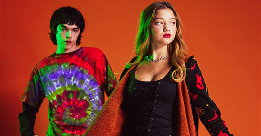 Models wearing the Max tie-dye t-shirt and Dani cardigan from the 2022 Hot Topic Hocus Pocus Collection