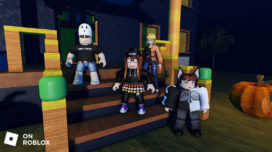 Roblox avatars stand on steps wearing new Hot Topic Forever Halloween avatar designs