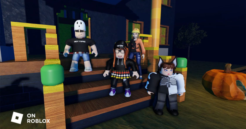 Roblox avatars stand on steps wearing new Hot Topic Forever Halloween avatar designs