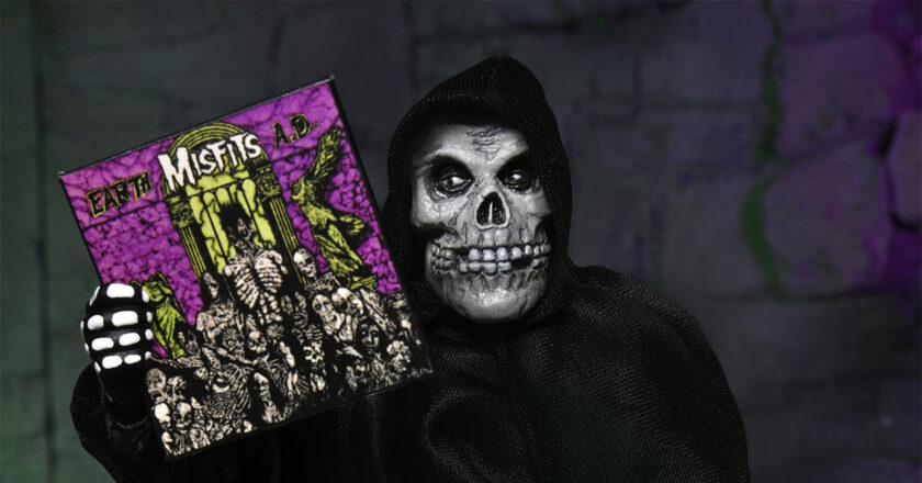 NECA's Misfits Ultimate Fiend figure holding its "Earth A.D." record accessory