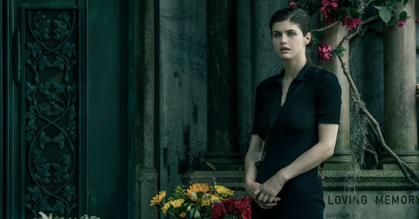 Alexandra Daddario as Dr. Rowan Fielding stands in front of a family mausoleum in Season 1, Episode 4 of "Mayfair Witches."
