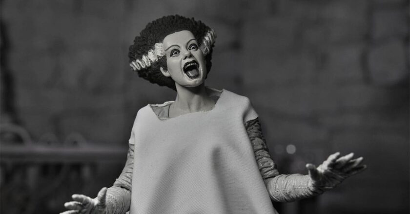 Photo of NECA's black and white Ultimate Bride of Frankenstein figure in a screaming pose.