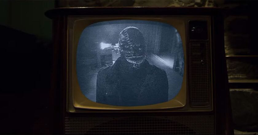 The villain from "The Blackening" shows on a black and white CRT television.