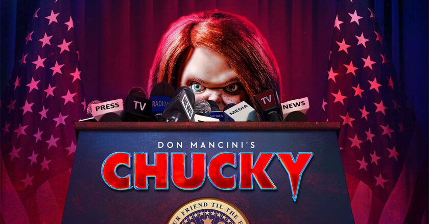 Chucky standing at a podium