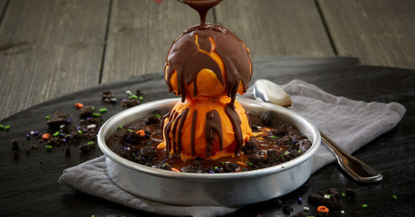 Chocolate being drizzled over a Spooky Pizookie