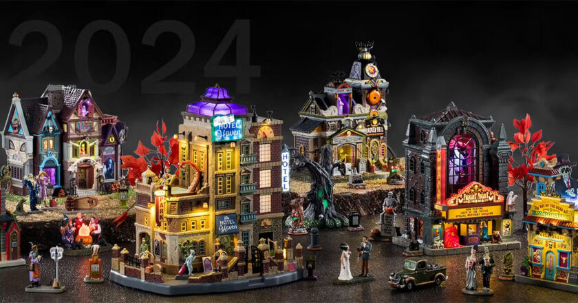 Various 2024 Lemax Spooky Town village pieces on display