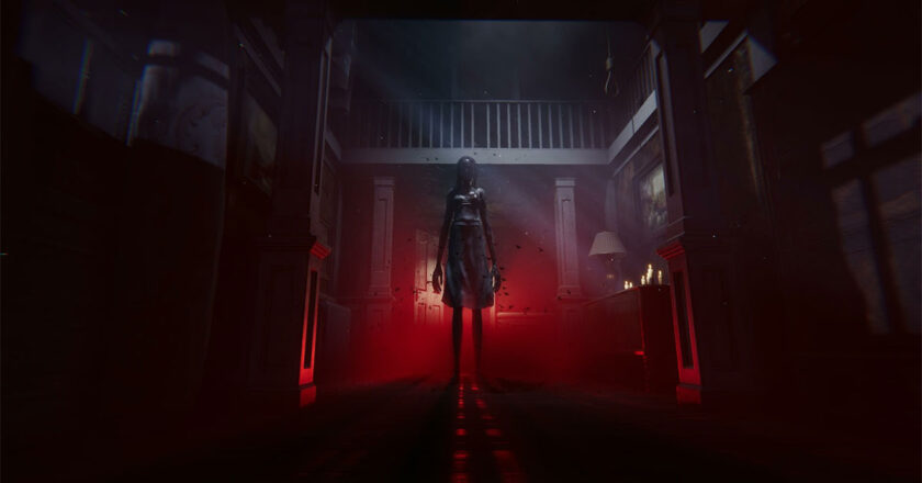 A creepy woman stands in a dark corridor with red light illuminating her from behind in "Haunted Bloodlines"
