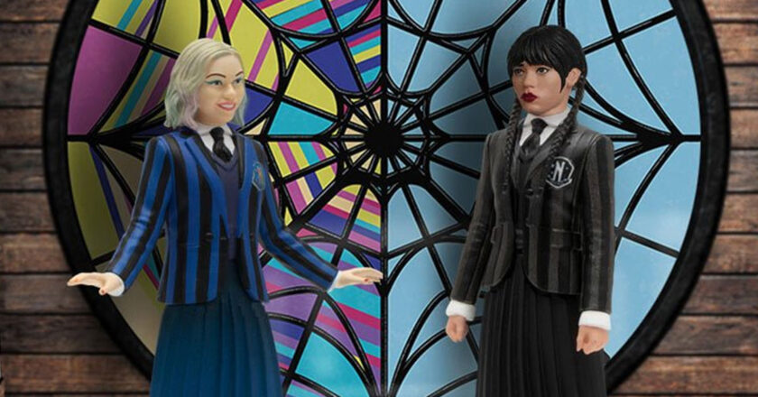 Wednesday & Enid action figures in front of the Ophelia Hall dorm-room playset stained-glass window