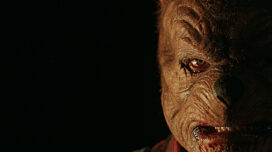 Winnie-the-Pooh peers from the shadows in "Winnie-The-Pooh: Blood and Honey 2"