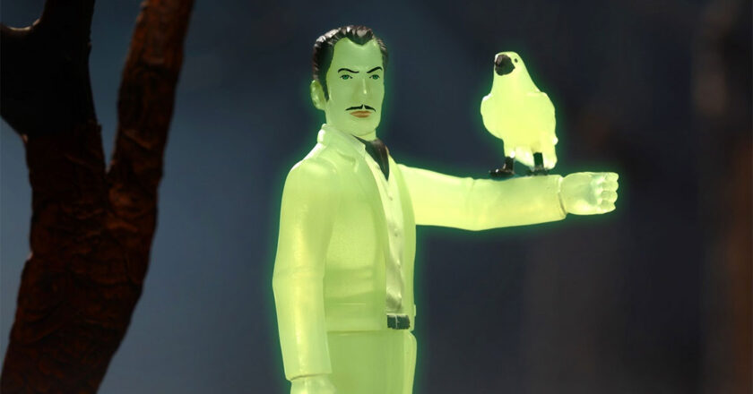 Glow-in-the-dark Vincent Price ReAction Figure holding its raven accessory