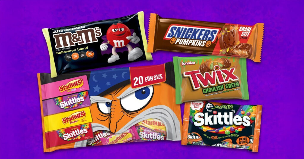 M&M's Halloween Blend, Snickers Pumpkins, Starburst and Skittles variety pack, Twix Ghoulish Green, and Skittles Shriekers