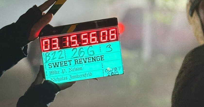 Sweet Revenge clapboard in a behind-the-scenes photo from the production